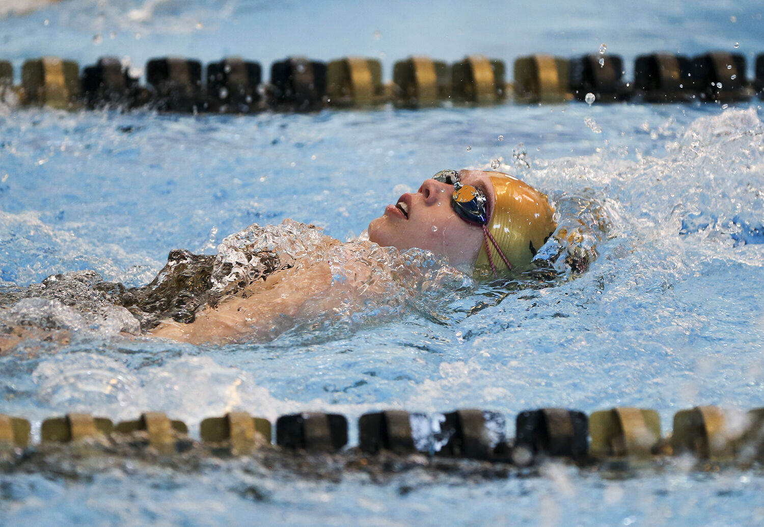 Bella Johnson pulls through he second half of her backstroke